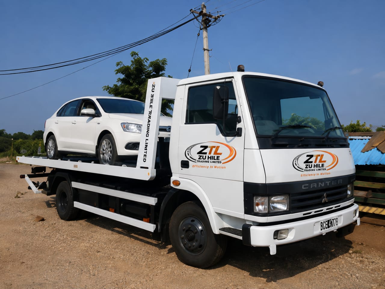 Zuhile Trading Limited car carrier truck loaded with a sedan
